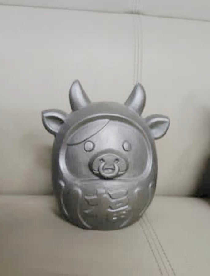 Cow cute Daruma statu